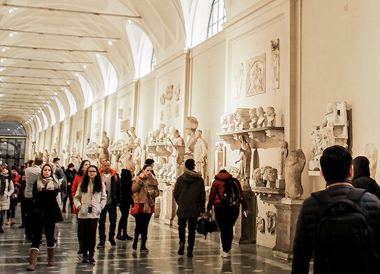 People on walking tour of museum.
